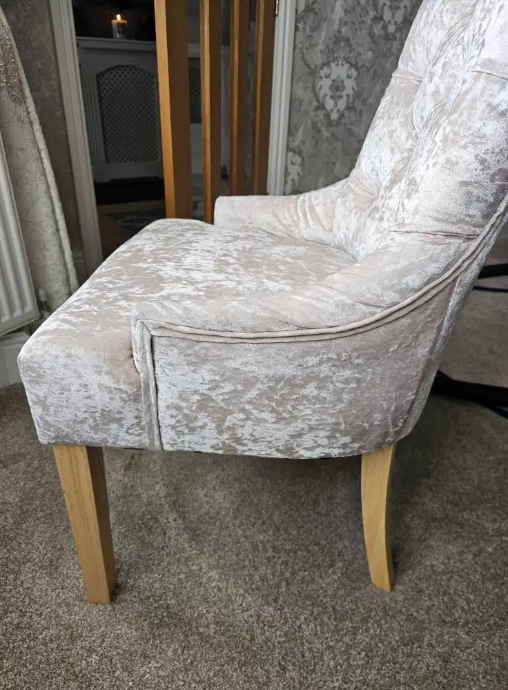 Cream crushed velvet accent chair with even clean pile after stain removal